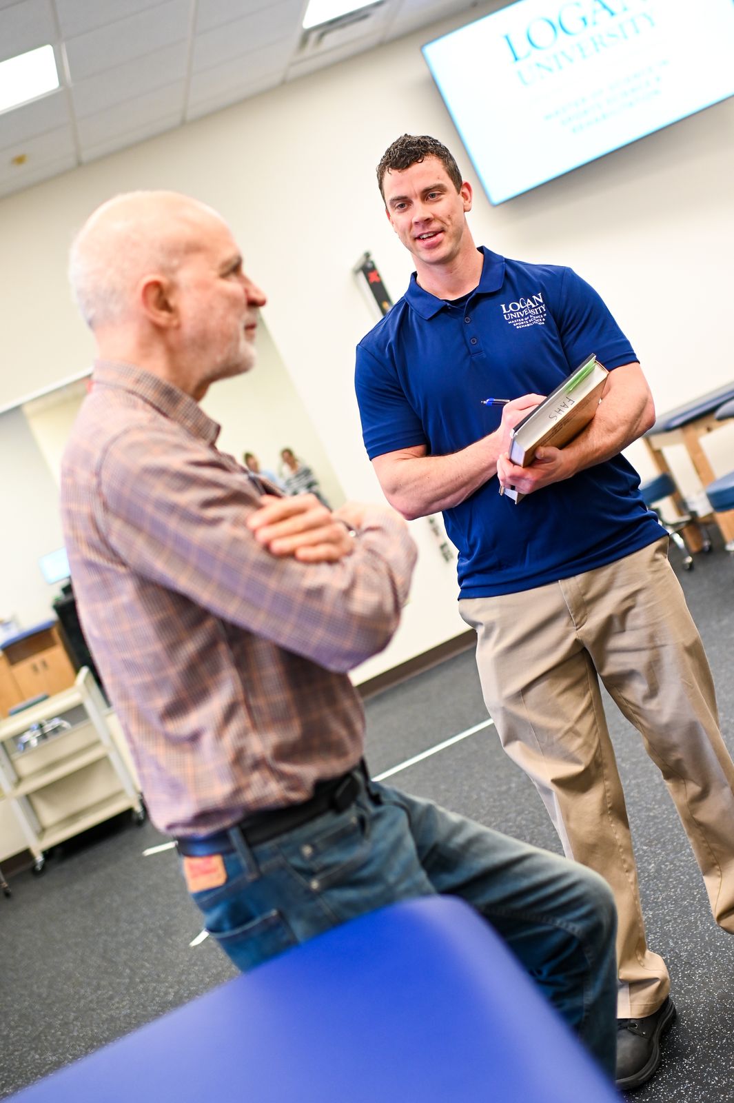 Logan University faculty mentoring students