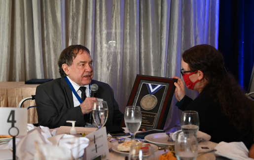 Dr. Norman Kettner gives brief remarks after receiving the inaugural Spirit of Logan Distinguished Alumni Award.