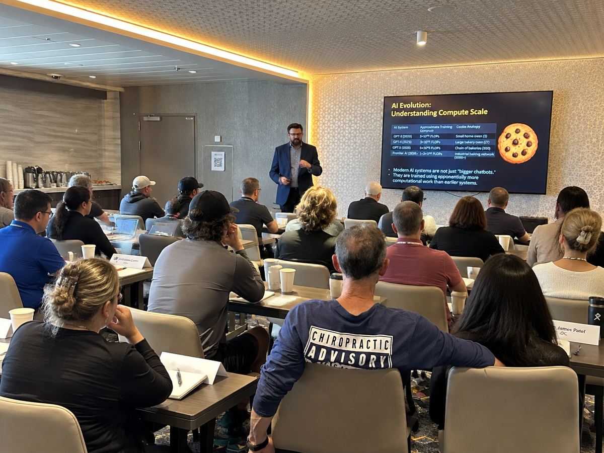 Chiropractors attend a Logan continuing education seminar on artificial intelligence in a conference room at sea
