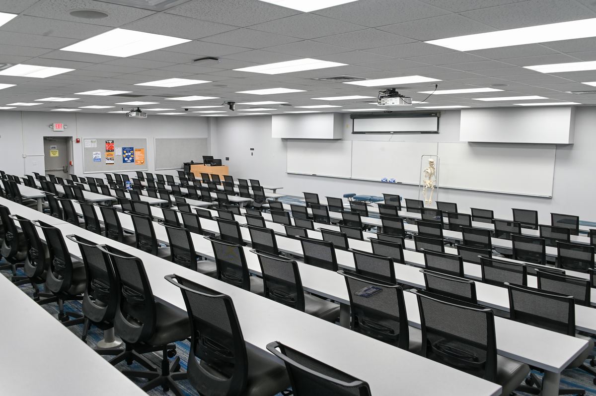 Classroom 142B looking up the tiered seating from the back