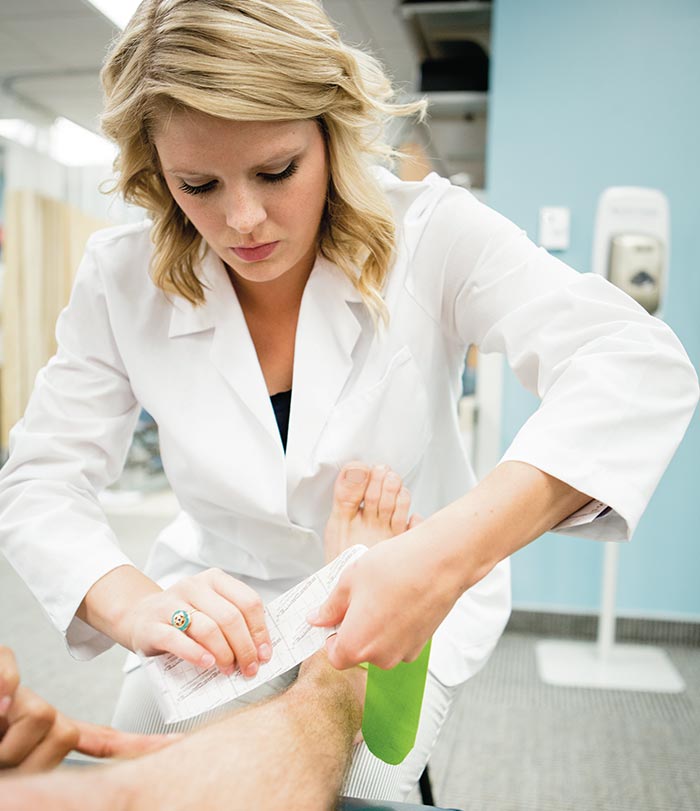 Female student working in the Human Performance Center.