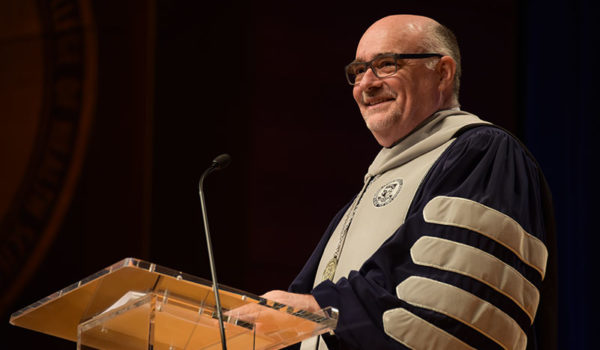 Dr. McDonald talking at commencement.