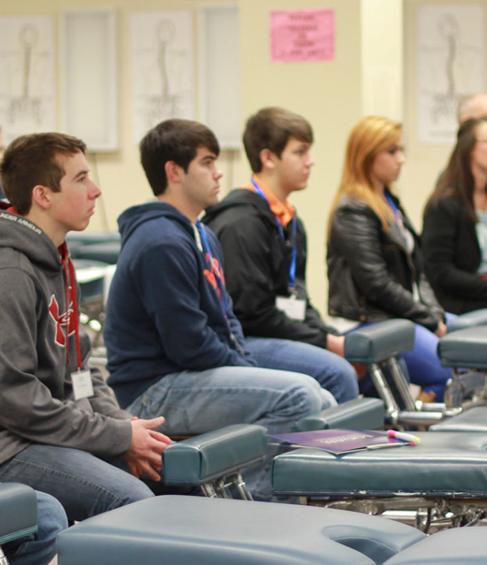 Students in a classroom at orientation.