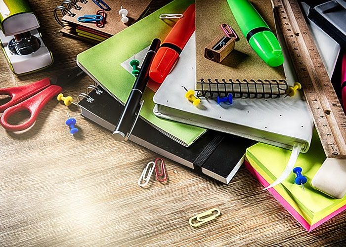 Office supplies on a desk.