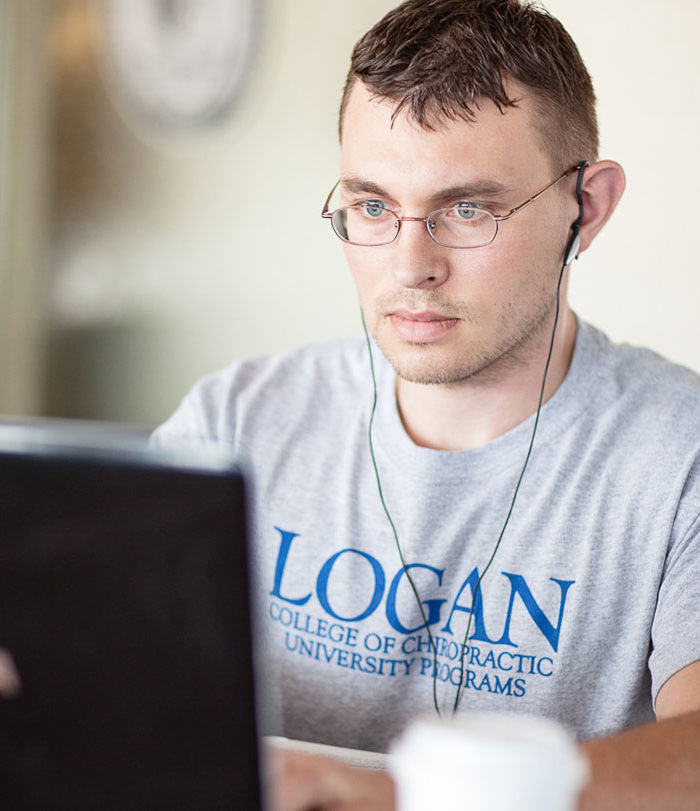 Male student working on a computer.