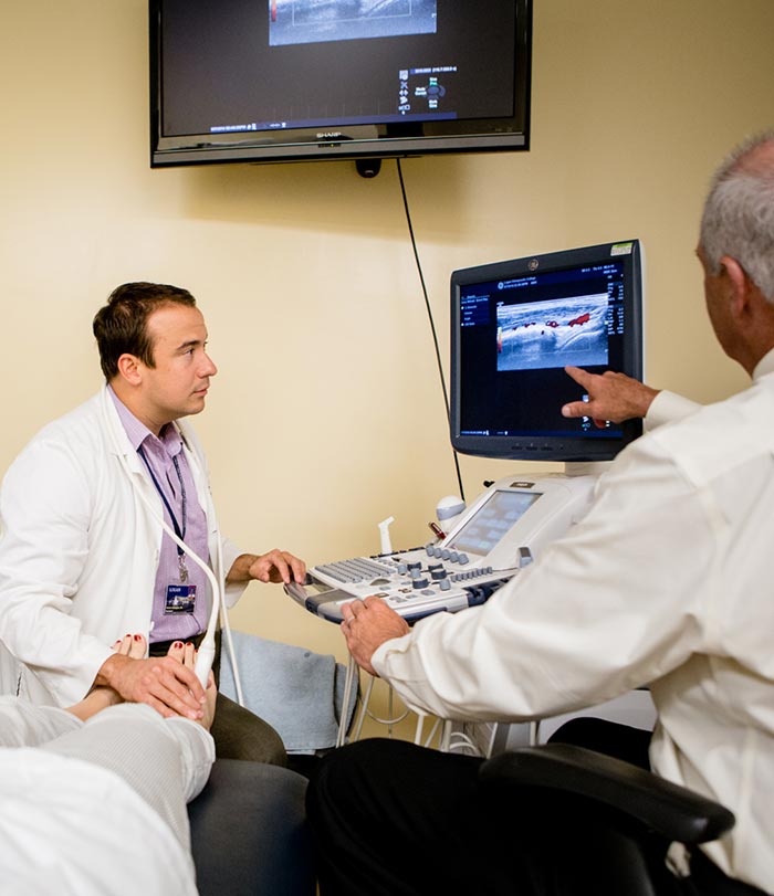 Students and instructor in radiology lab.