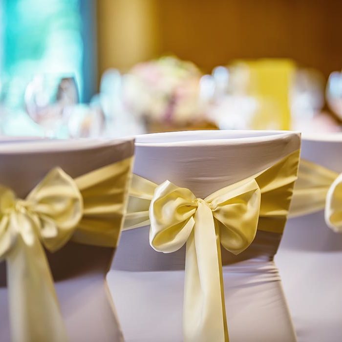Close up of wedding chair covers.
