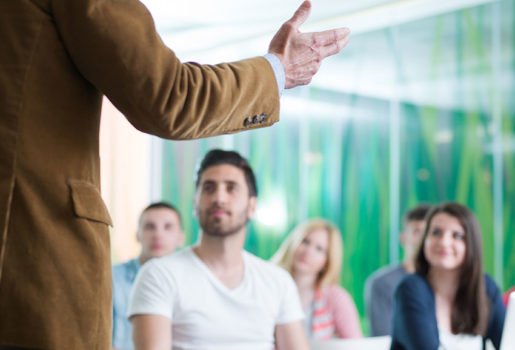 Teacher talking to his class.