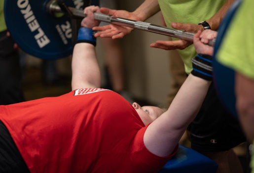 Competitor lifts during 2019 Junior Nationals; Photo by Reed Hoffmann, courtesy of Move United.