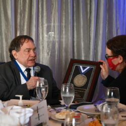 Dr. Norman Kettner gives brief remarks after receiving the inaugural Spirit of Logan Distinguished Alumni Award.